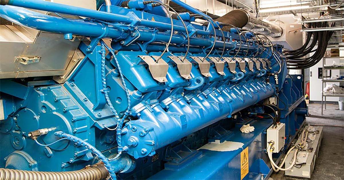 MWM TCG 2020 V20 gas engine in signature blue inside a containerized CHP plant at Cold Storage Facility ZAPADNY LLC, supplying power and heat for the food industry.